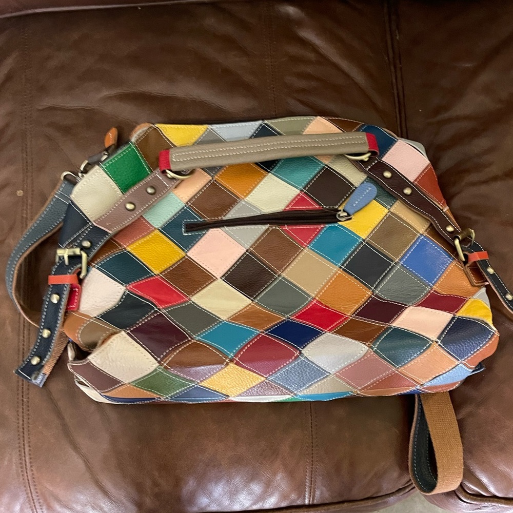 Only used a few times. Has three pockets on one side and two on the other.